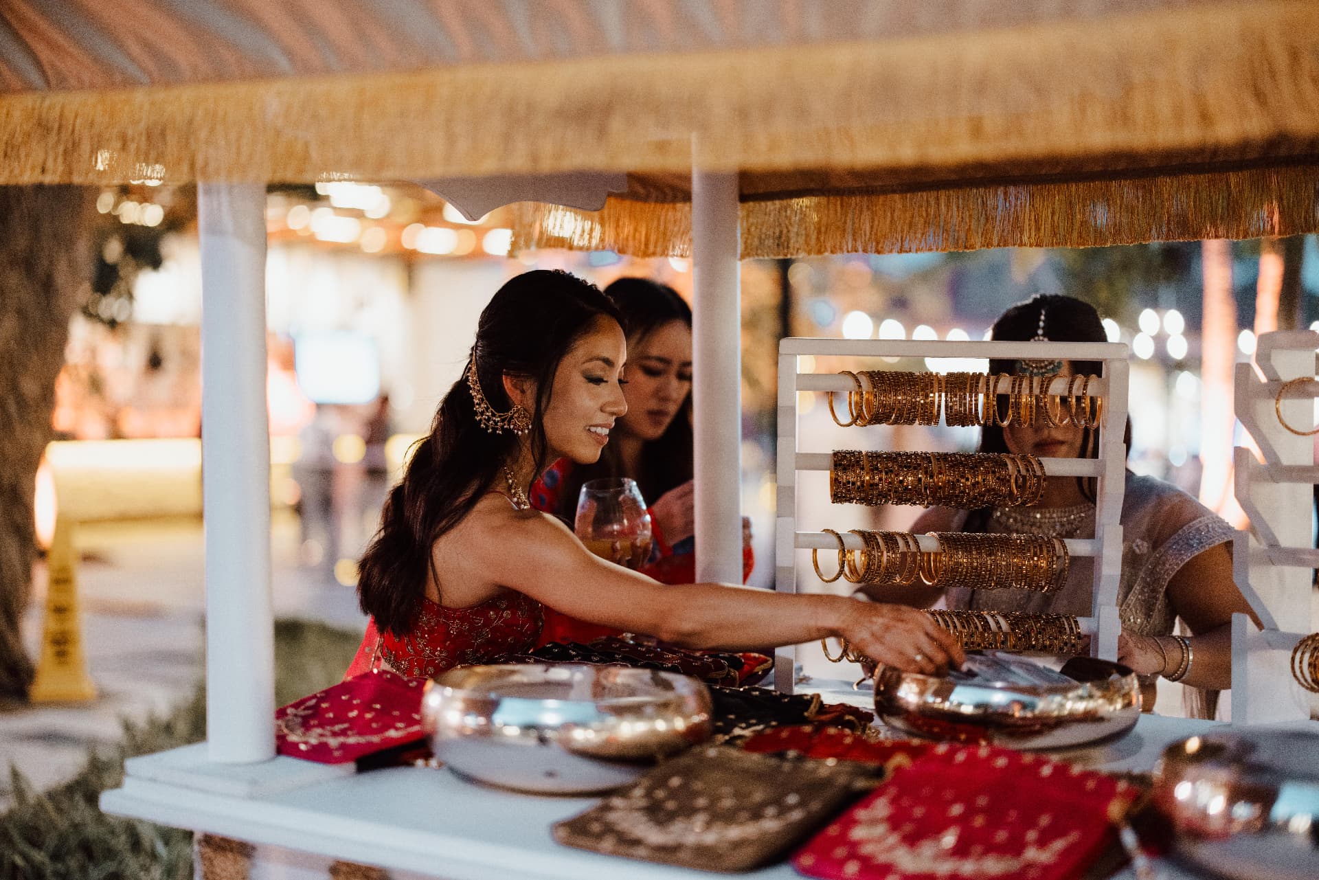 Bangle station with a woman in red