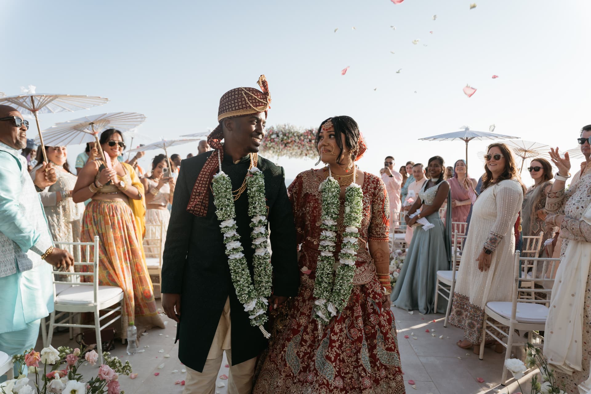 Cynthia and Azriel walking together after the ceremony