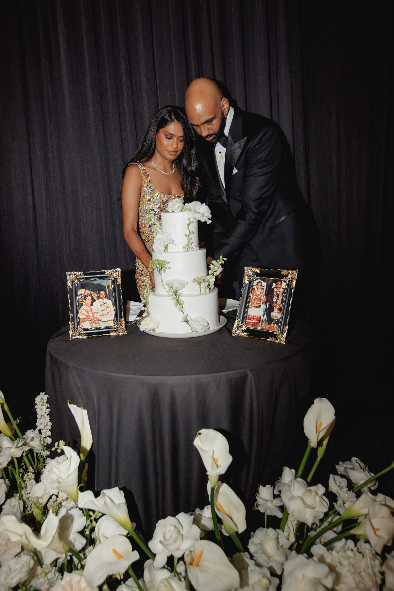 Shivam and Prarthi cutting their wedding cake