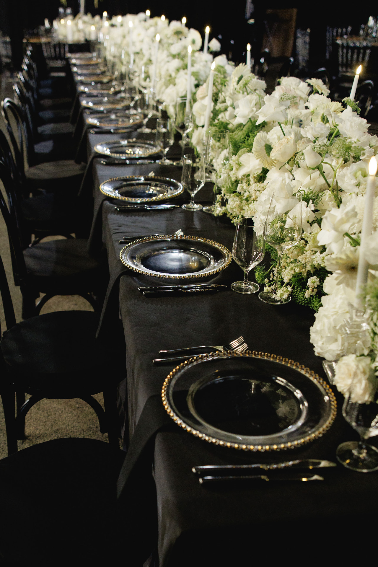Black and white candlelit reception tablescape