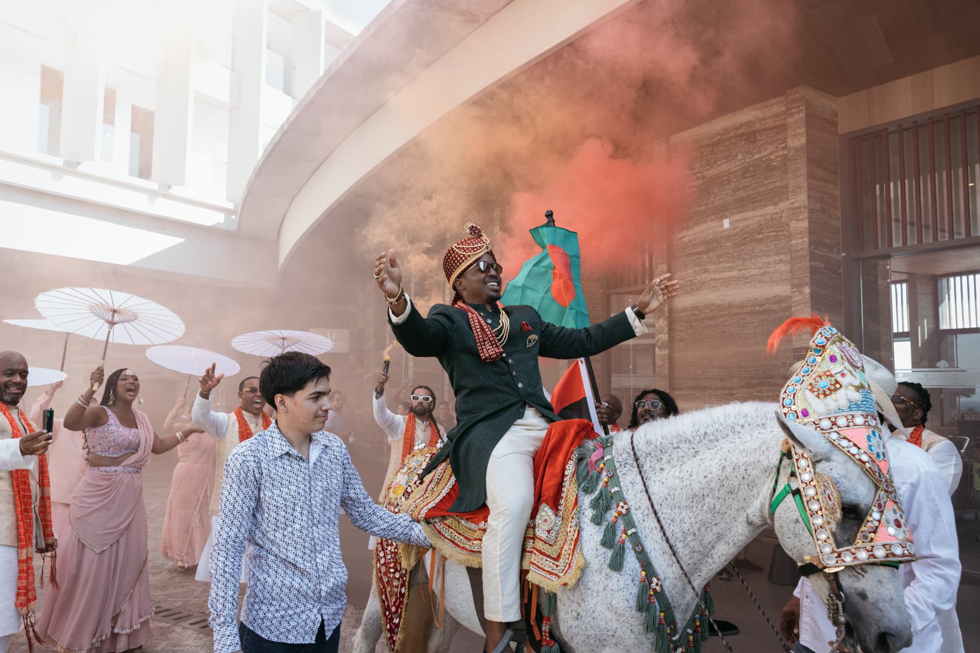 Azriel arriving on horseback surrounded by celebrating loved ones